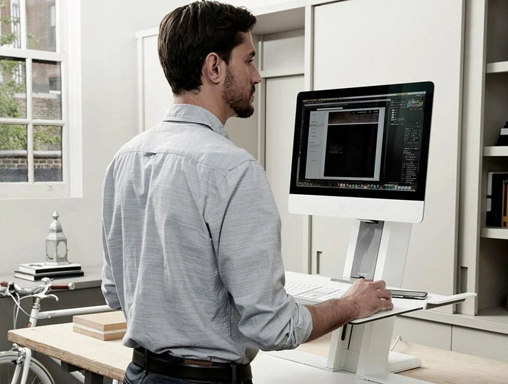 Humanscale Quickstand Sit To Easy And Portable Desk Converter 8 In White With Single Monitor In Office