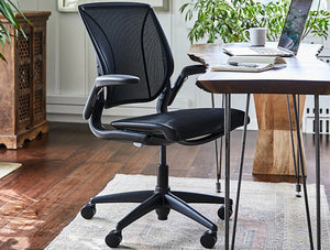 Humanscale Smart Ocean Comfortable Mesh Task Office Chair In Black With Black Trim And Wooden Top Table