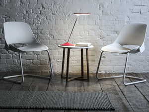Humanscale Trea Chair With Ergonomic Comfort For Office And Home 4 In Four Leg Base With Side Table And Desk Lamp