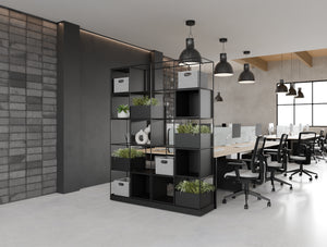 Ionic 2x Double Grid Zoning System in Black with Key Bench Desk and Grey Finish Light Desk Screen And Aria Ergonomic Chair in Modern Office Setting