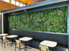 Java Acoustic Vertical Garden in Green Finish with Canteen Table and Chairs in Restaurant Setting