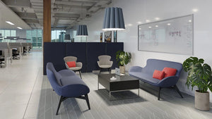 Kate Moodlii Upholstered Sofa In Blue Finish With Black Top Coffee Table And Acoustic Hanging Light In Breakout Setting