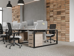 Key 3 Drawer Slimline Pedestal in Oak Finish with Aria Ergonomic Chair and Light Desk Screen Attached in Key Bench Desk in Modern Office Setting