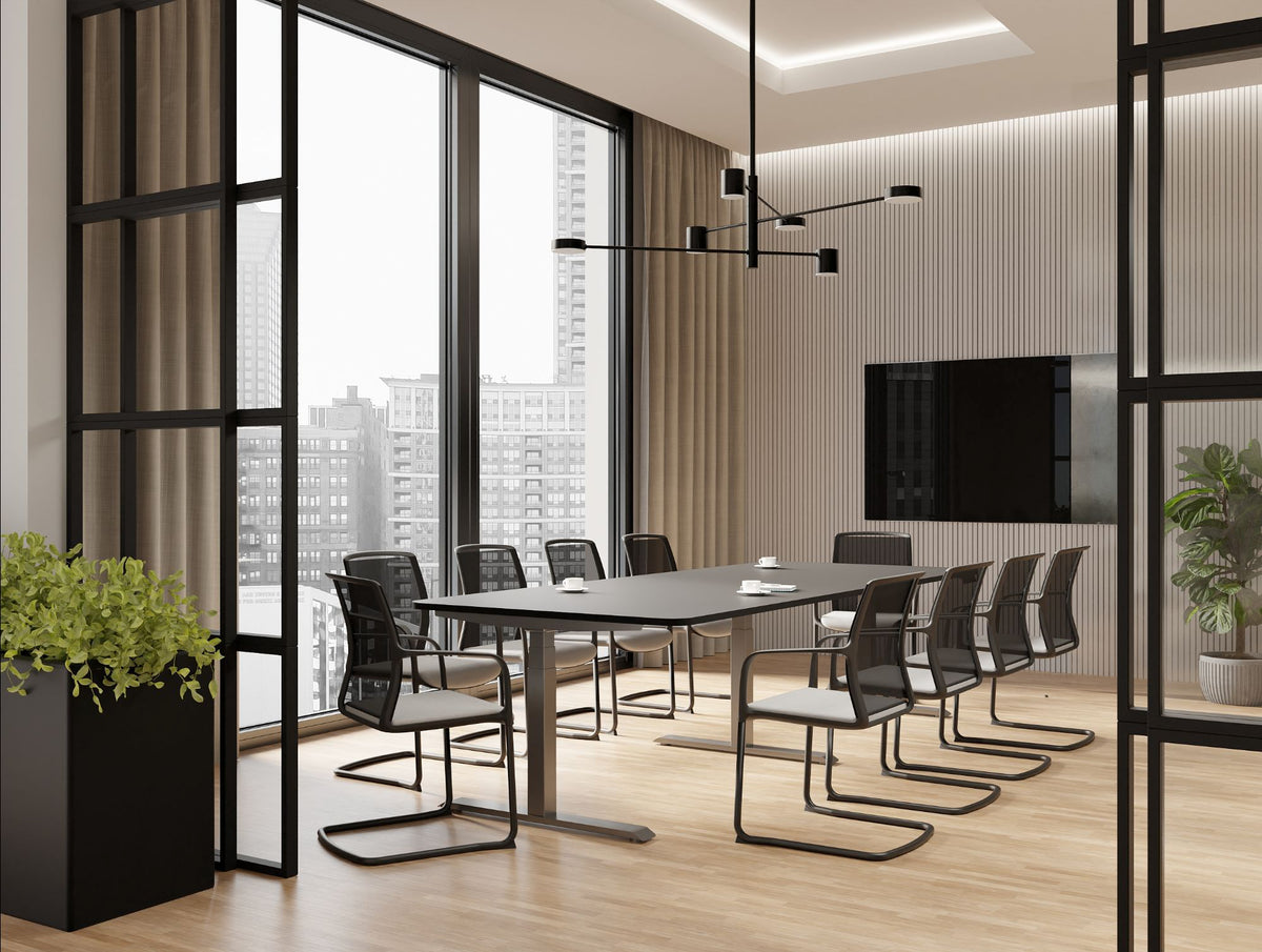 Levo Meet Sit Stand Table with Vela Sled Base Chair in Boardroom Setting 2