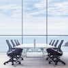 Liberty Ocean Ergonomic Office Armchair In Black Finish With White Straight Desk In Meeting Room Setting