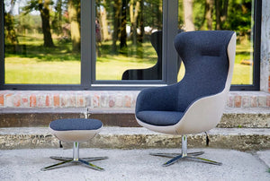 Loop Upholstered Lounge Armchair In Two Toned Finish With Metal Leg Footrest In Outdoor Setting