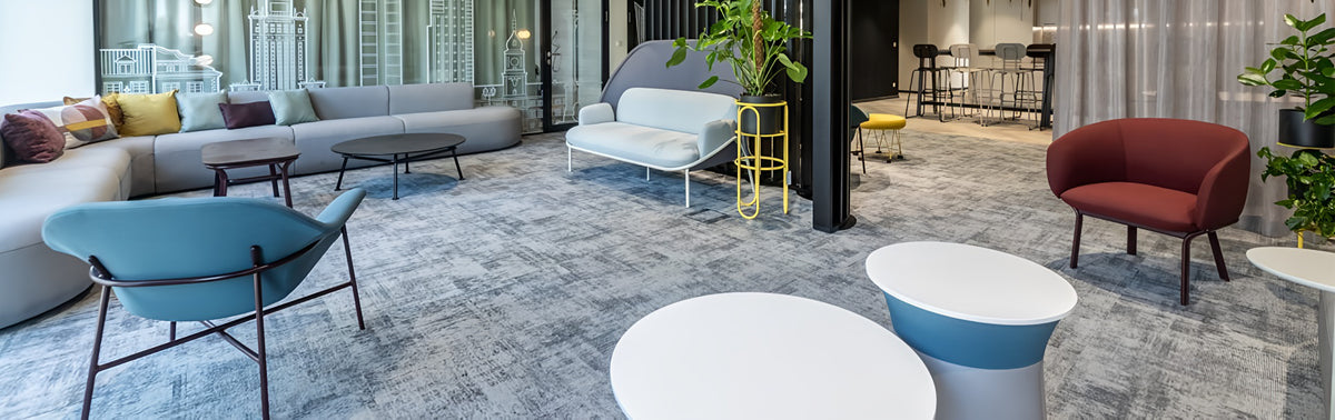 Lounge Chair With Round Conical Coffee Table And Indoor Plant In Breakout Setting_298B0E84 1498 4B10 8080 108125F97137