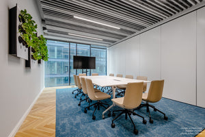 Lumi Executive Armchair with Rectangular Table in Meeting Room Setting