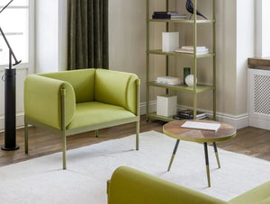 Mdd Stilt Monochromatic Armchair 9 In Green With Round Coffee Table And Green Book Shelf In Living Room Setting