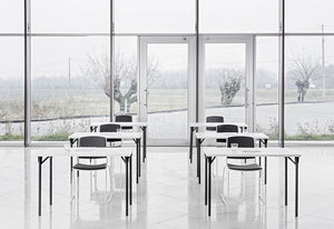 Mara Piuma Rectangular Table In Folding Steel Legs 4 With White Leg Finish Chair In A Company Hall Setting