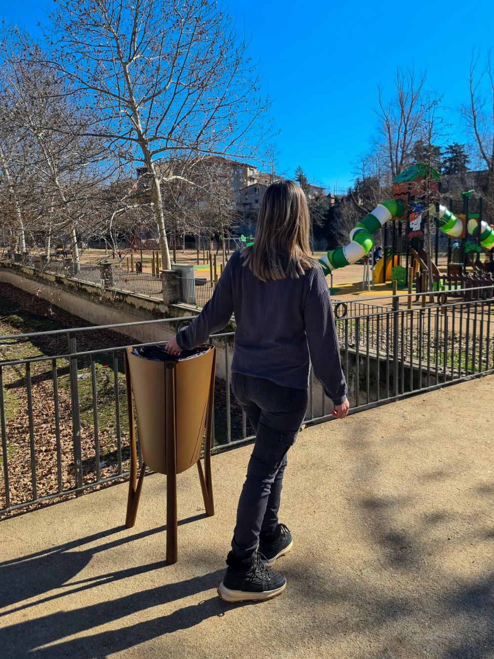 Minsk Outdoor Waste Bin in Brown Finish Outdoor Setting 5