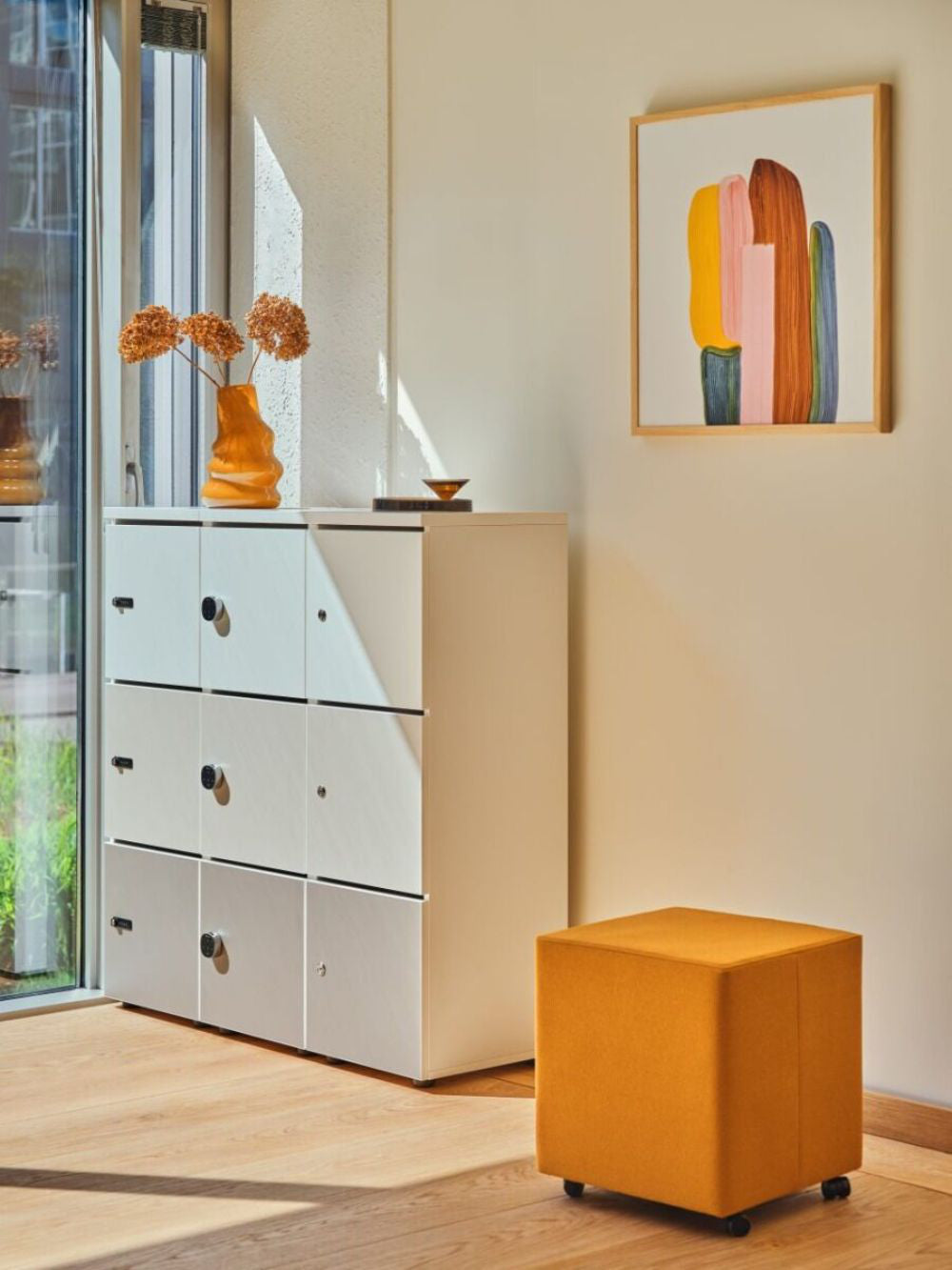 Mix Cube Soft Seating Geometric Pouffe with Metal Lockers and Wall Art in Breakout Setting
