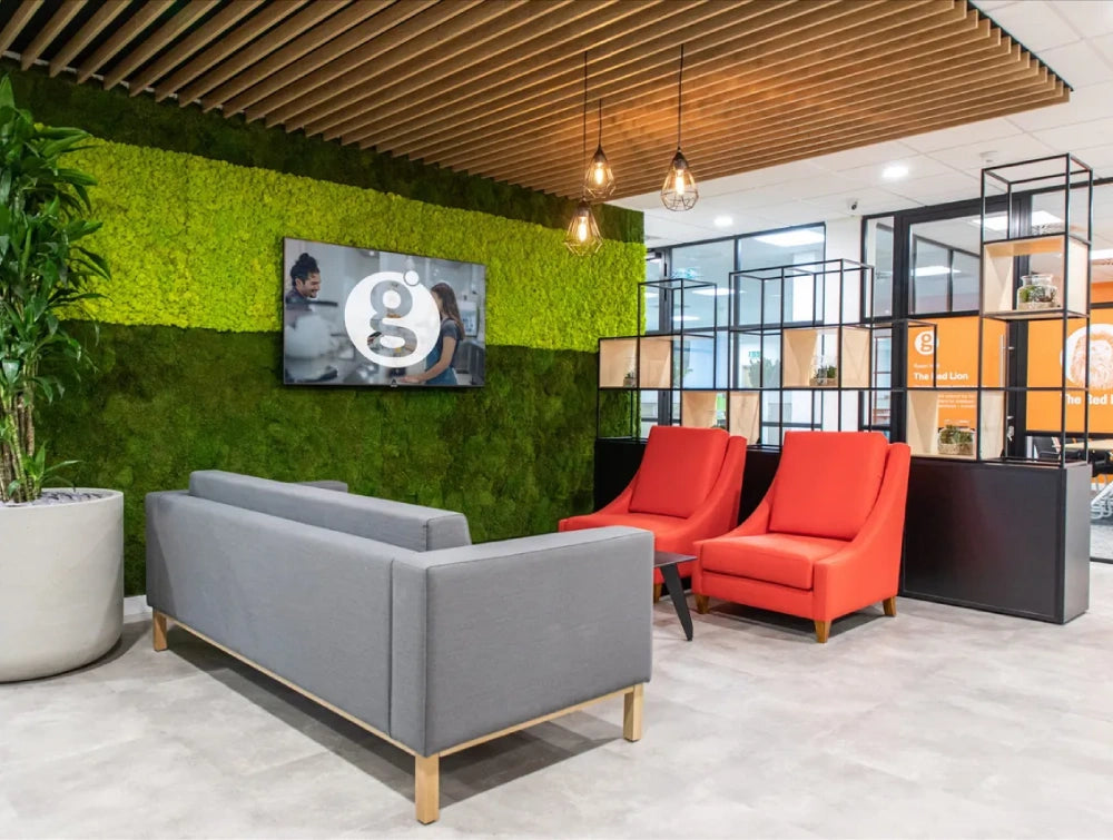 Modular Sofa Office Furniture In Light Grey Finish With Red Lounge Chair And Zoning System In Breakout Setting