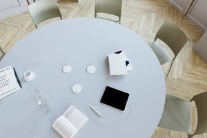 Mono Giant Round Meeting Room Table With Power With Chairs In Breakout Setting 2