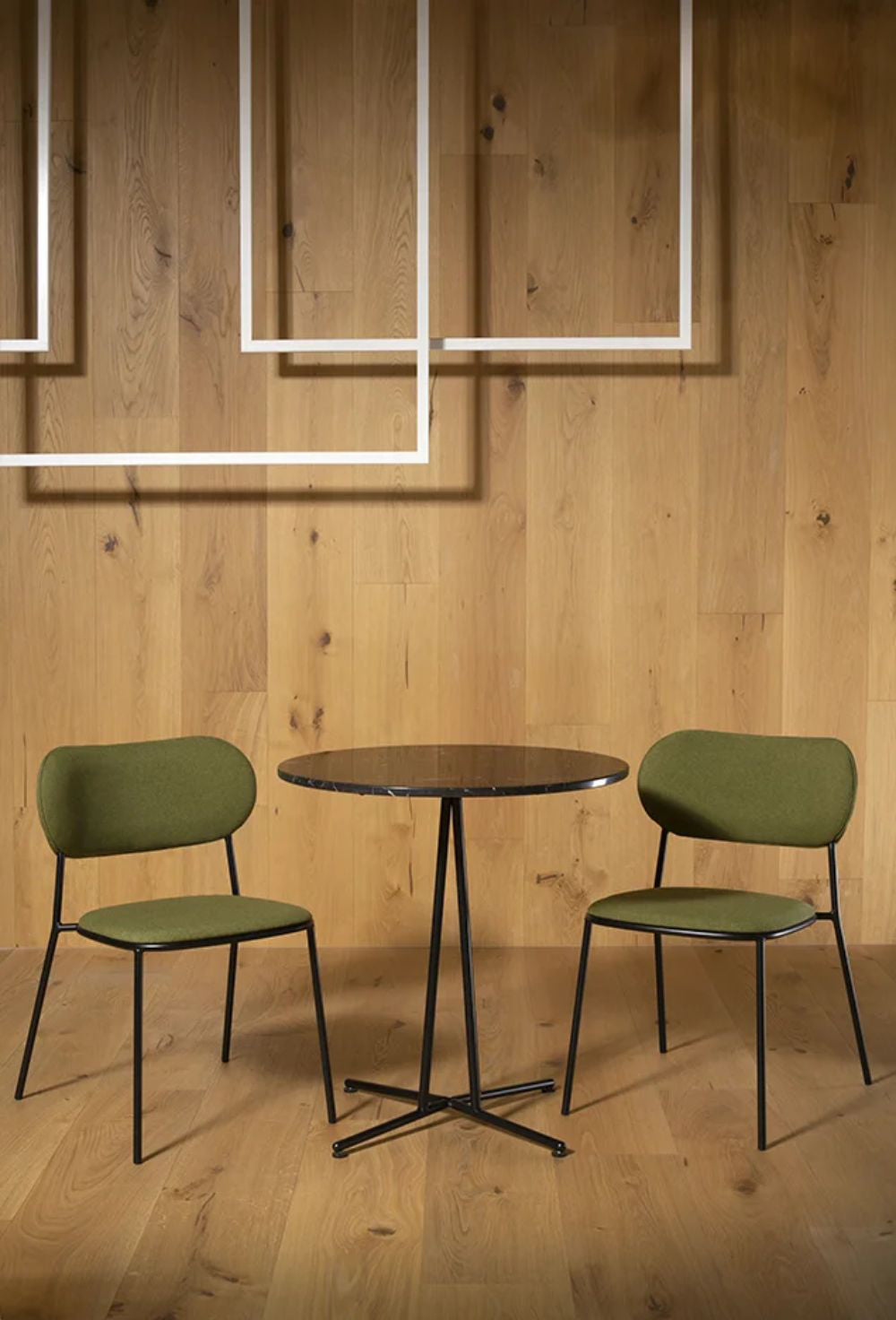 Nuta Light Upholstered Chair With Round Table In Breakout Setting 2