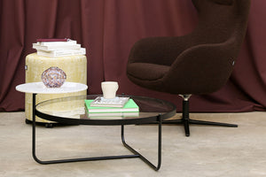 Orbit Round Low Coffee Table With Lounge Chair And Pouffe In Breakout Setting