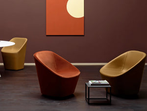 Pedrali Log Upholstered Lounge Armchair 14 In Orange And Gold At A Cafe
