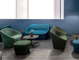 Pedrali Log Upholstered Lounge Armchair 15 In Dark Green With Two Seater Sofa And Pouf In A Cafe