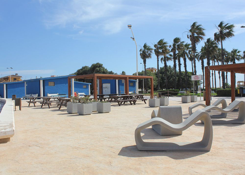 Petrus Outdoor Deck Chair with Planters and Tables in Outdoor Setting