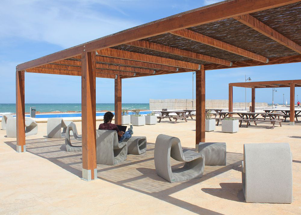 Petrus Outdoor Deck Chair with Tables and Benches by the Beach Area