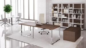 Narbutas Plana Executive Desk In Dark Oak Finish With White High Back Armchair And Bookshelves In Office Setting