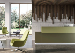 Quadrifoglio Z1 Reception Desk In Green Finish With White Top Small Coffee Table And Grey Armchair In Reception Setting