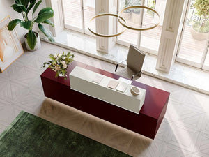 Quadrifoglio Z1 Reception Desk In Red Finish With Round Ceiling Accessory And Light Brown Armchair In Reception Setting