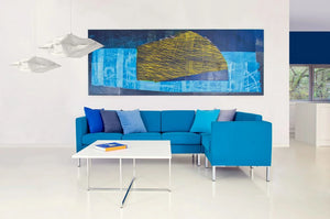 Quick Square Reception Table in White Top with Blue Modular Sofa in Living Room Setting