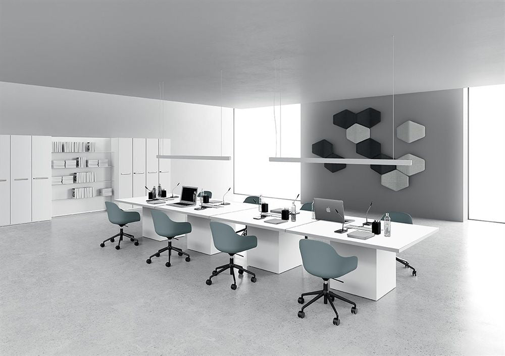 Rectangular Meeting Room Table with Cube Legs in White Finish with Bookshelves and Tub Chair in Collaborative Setting