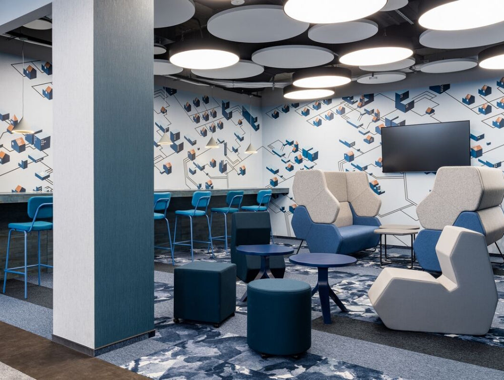 Round Coffee Table Office Furniture With Pouffe And Blue High Stool In Breakout Setting