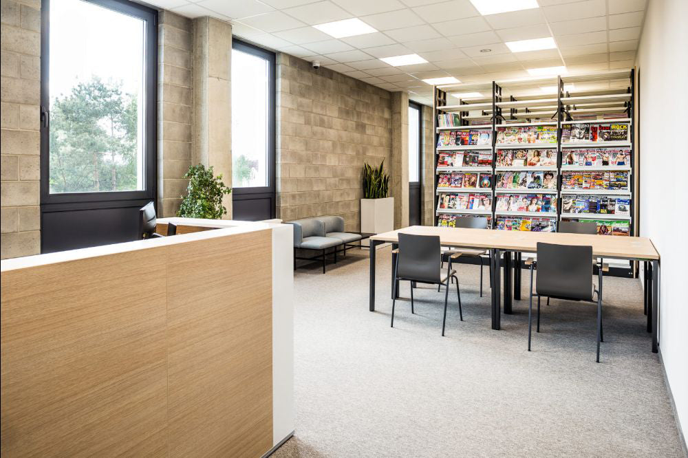 Shila A Frame Multitasking Chair with Upholstered Seat with Meeting Room Table and Modular Seating in Reception Area