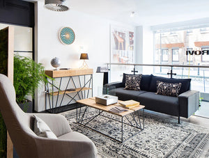 Snug Modern Sofa With Black Upholstered Finish And Coffee Table For Reception Areas