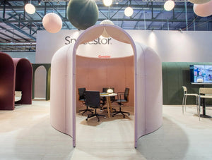 Spacestor Arcadia Pantheon Workspace Partition System In Pink With Round Wooden Table And Black Chair