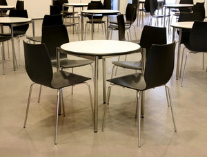 Spacestor Mezzo Classroom Table 7 In Round Variant With Black Chair In Cafeteria Setting