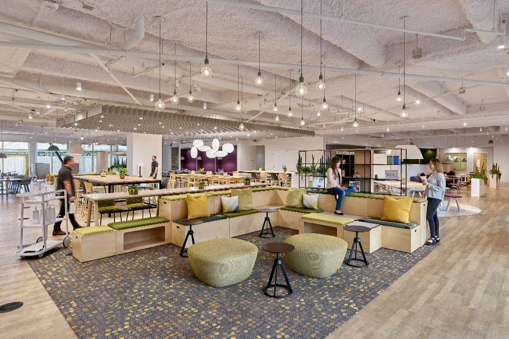 Spacestor Modular Zoning Wooden Bleacher System with Green Coffee Table and Stool in Restaurant Setting