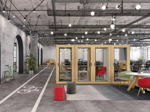 Spacestor Residence Work Wooden Box Acoustic Phone Booth and Workstation with Round Top Table and Colourful Armchair in Open Space Office Setup