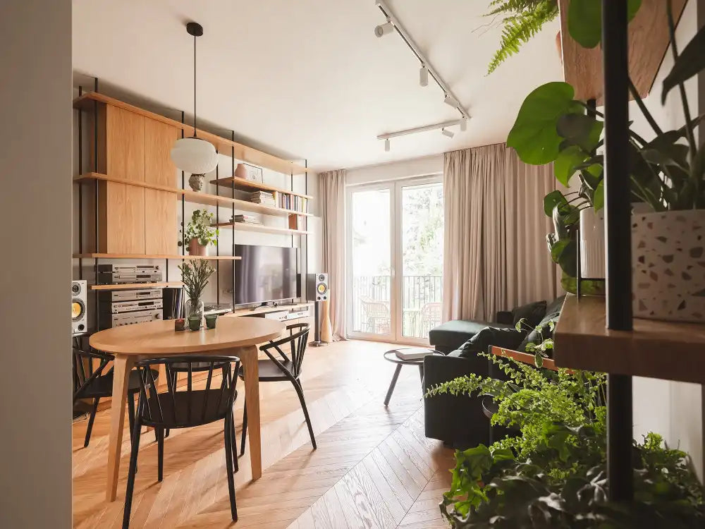 Sudoku Wooden Dining Chair in Black Finish with Round Table and Sofa in Living Room Setting