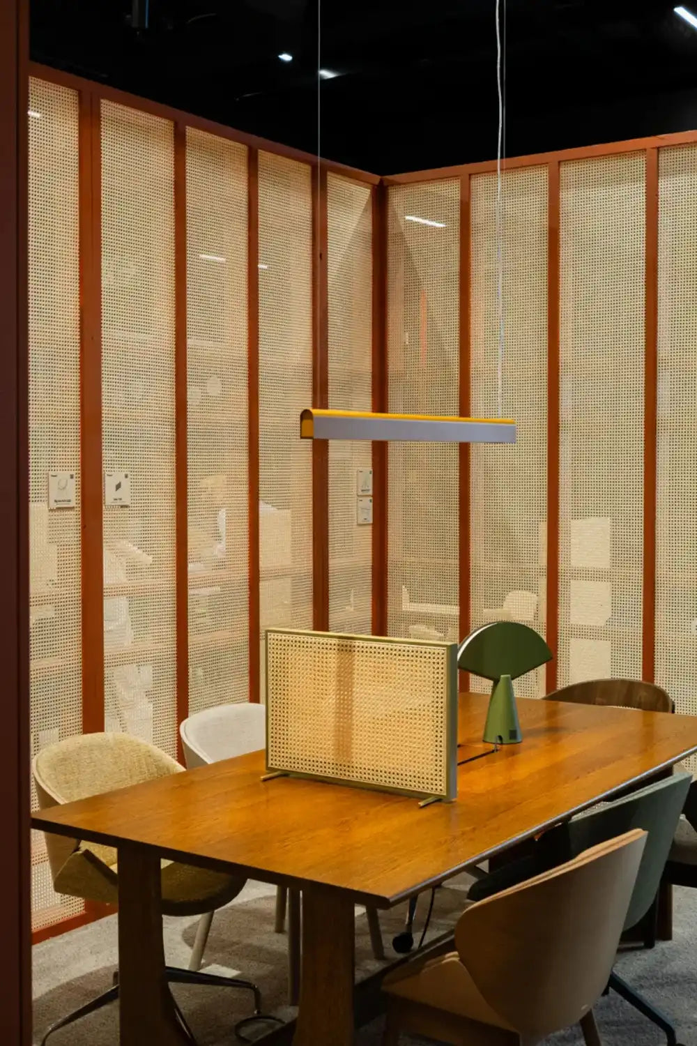 Sund M Wooden Meeting Room Table with Tub Chair and Desk Screen in Modern Office Setting