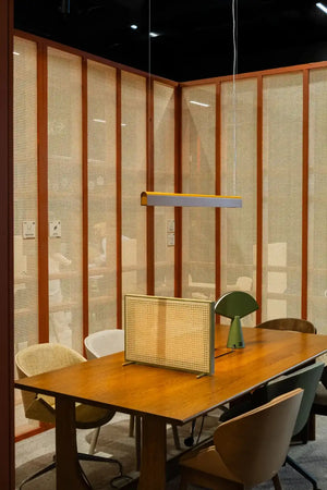 Sund M Wooden Meeting Room Table with Tub Chair and Desk Screen in Modern Office Setting
