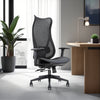 Ultra High Back Task Chair with Adjustable Lumbar Support & Knee Tilt Mechanism with Rectangular Wooden Desk and Indoor Plants in Modern Office Setting