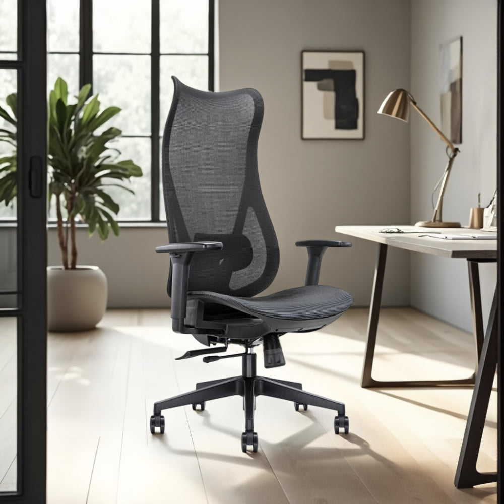 Ultra High Back Task Chair with Adjustable Lumbar Support & Knee Tilt Mechanism with White Rectangular Desk and Indoor Plant in Modern Office Setting