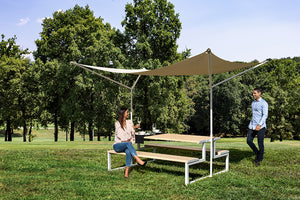 Urbantime .H24 Miami Outdoor Metal Sun Shade In Two Toned Finish With Transparent Wine Glass In A Park Setting