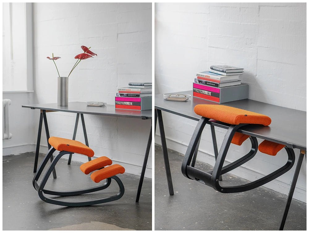 Varier Variable Kneeling Chair 12 In Orange Finish With Black Rectangular Table