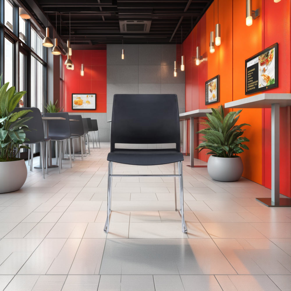 Verse Multipurpose Stackable Chair with Canteen Table and Indoor Plant in Breakout Setting