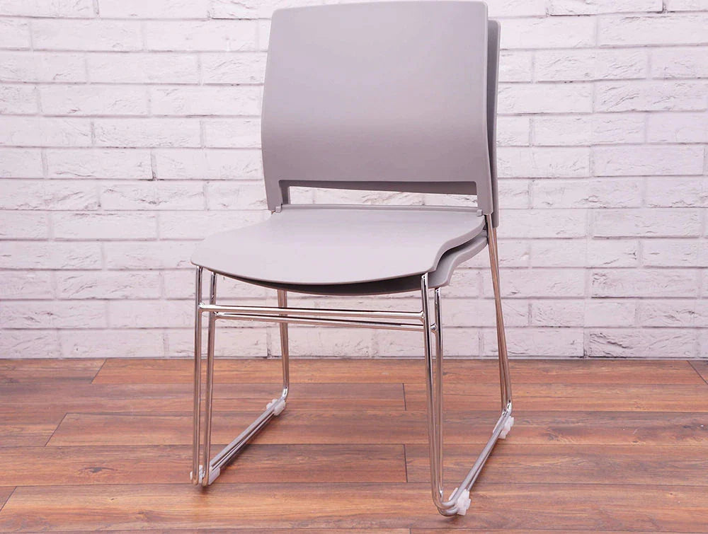 Verse Multipurpose Stackable Chair with Canteen Table and Indoor Plant in Breakout Setting