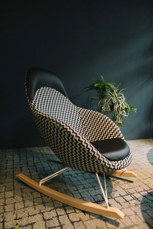Vieni High Backrest Rocking Chair with Indoor Plant in Breakout Setting