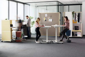 Wariant Height Adjustable Compact Desk With Castors In White Finish With Mobile Table And Mobile Wall In Breakout Setting