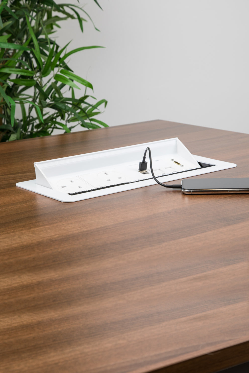Wave 2 UK Sockets In Desk Power Module White Attached in the Table