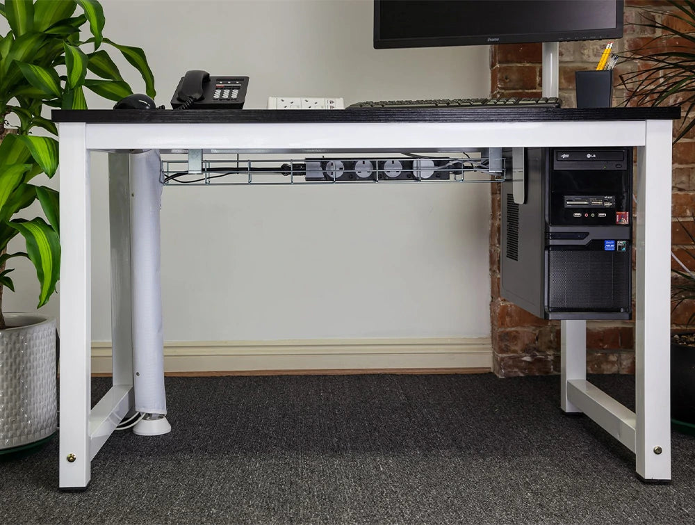 Wire Cable Basket Under White Desk With Black Power Module Beside Cpu With Holder