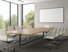 Ws.D Harmon Multiple Cylinder Based Table with White Armchair in Meeting Room Setting
